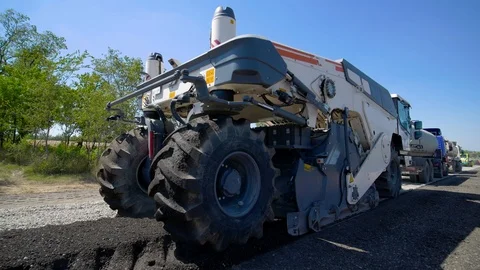 Construction of Highways.Soil Stabilisers and Cold Recycling Machines.The Stock Footage 96393217
