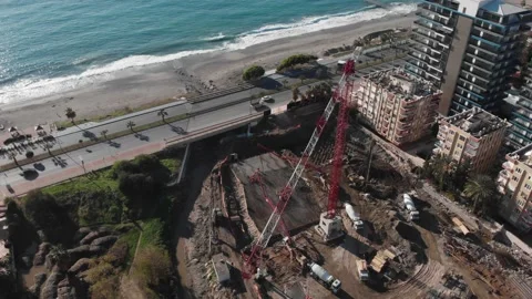 Construction of hotel complex near sea coastline. Building site with tower Stock Footage 167435615