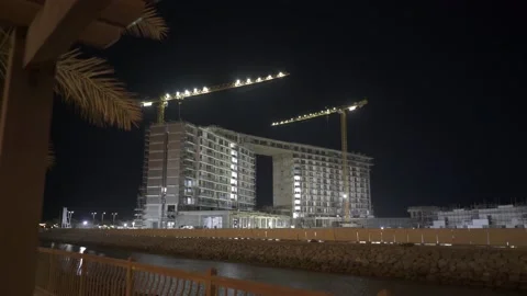 Construction of a hotel on the ocean, night Stock Footage 152161717