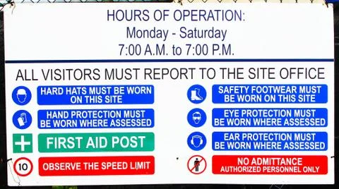Construction Hours of Operation and Caution Sign Stock Photos