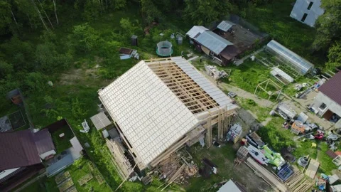 Construction of a house in the forest with a drone Stock Footage 236356558