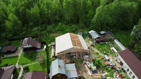 Construction of a house in the forest with a drone Stock Footage 236356595