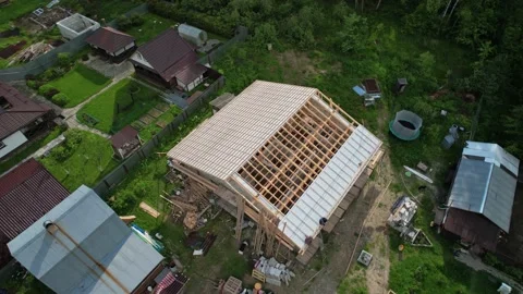 Construction of a house in the forest with a drone Stock Footage 236356606