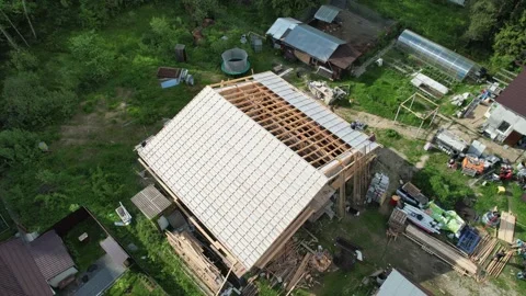 Construction of a house in the forest with a drone Stock Footage 236356635