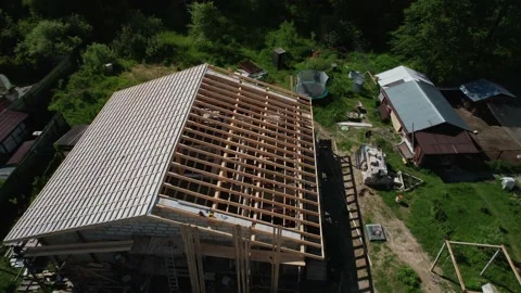 Construction of a house in the forest with a drone Stock Footage 236356649