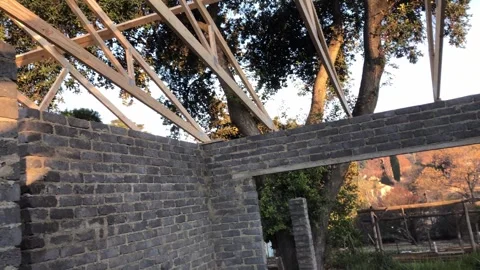 Construction of a house, rendered walls and unfinished  celling Video stock 252345332