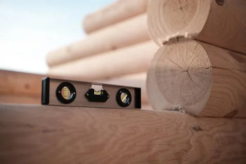 Construction of a house from rounded logs Stock Photos