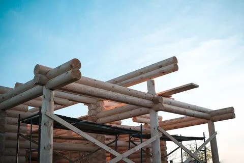 Construction of a house from rounded logs Stock Photos