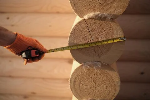 Construction of a house from rounded logs Stock Photos