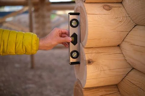 Construction of a house from rounded logs Stock Photos