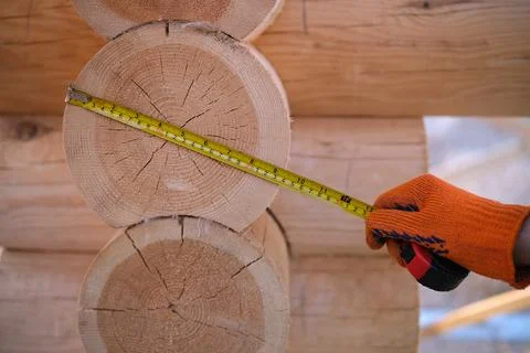 Construction of a house from rounded logs Stock Photos