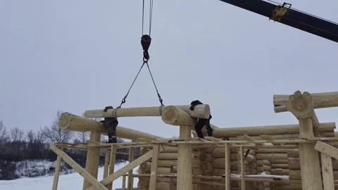 Construction of a house from solid logs. 動画素材 306451975