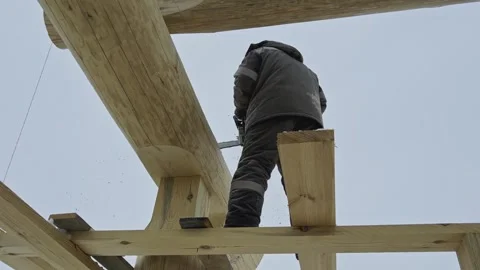 Construction of a house from solid logs. Slow motion video. Video stock 301692469
