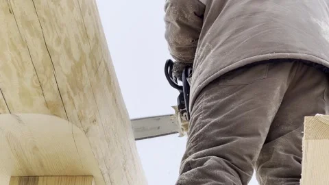 Construction of a house from solid logs. Slow motion video. Stock-Footage 303359510