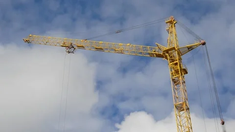 Construction of a house with a tower crane. Bottom view. Stock Footage 135838071