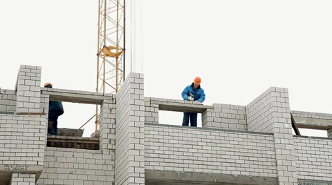 Construction of a house in winter Stock Footage 61256059