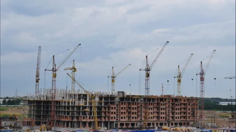 The construction of the house, working construction cranes ,  timelapse Stock-Footage 64912429