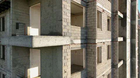 Construction of houses, the process of preparing the facade for cladding Stock Footage 231188589