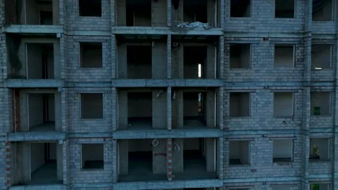 Construction of houses, the process of preparing the facade for cladding Aerial Stock Footage 231189458