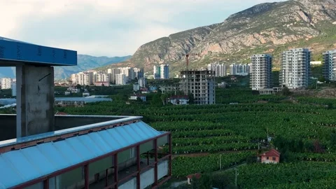 Construction of houses, the process of preparing the facade for cladding Aerial Stock Footage 231189493