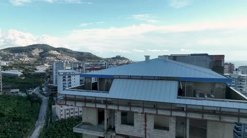 Construction of houses, the process of preparing the facade for cladding Stock Footage 231190857