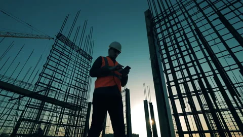 Construction industry, construction project, building process during sunset Stock Footage 133767365