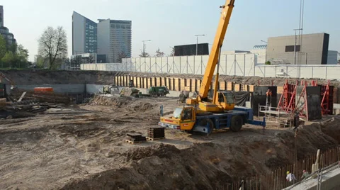 Construction industry site people work crane excavator trucks Stock Footage 33029192