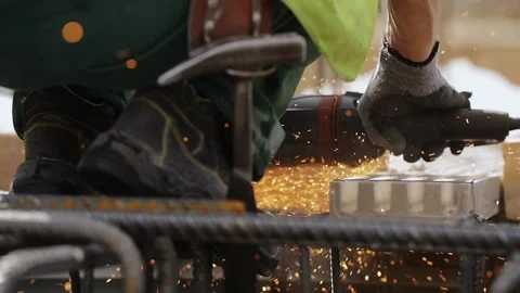 Construction industry worker on a modern construction site -- slow motion Stock Footage 89917015