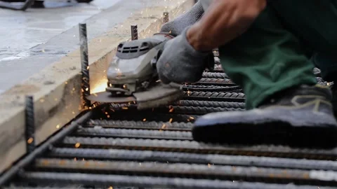 Construction industry worker on a modern construction site -- slow motion Stock Footage 89917545
