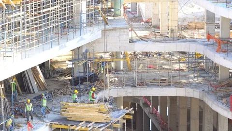 Construction industry workers working on building concrete structure. Video stock 85607403