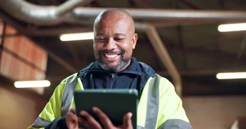 Construction, inspector and happy man with tablet in building, browsing and Video stock 338047723