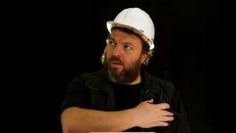 Construction inspector with helmet is dissatisfied with something and speaks 스톡 동영상 121604814