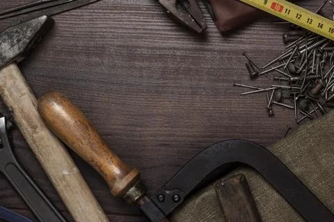 Construction instruments on the wooden background Stock Photos