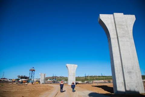 Construction of the interchange of a road bridge across the river Stock Photos