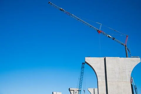 Construction of the interchange of a road bridge across the river Stock Photos