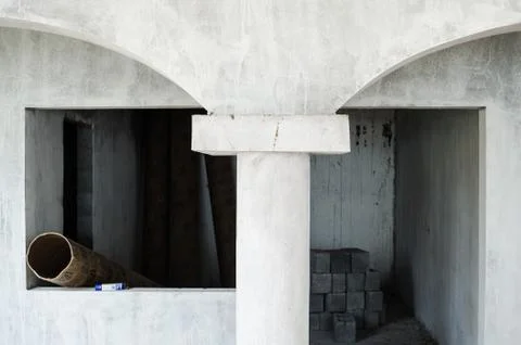Construction of the interior of a house made of gray cement started, unfinish Stock Photos