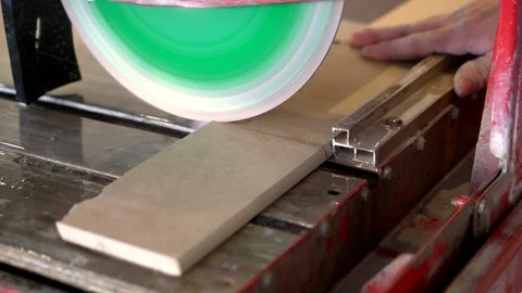 Construction interior men work builder cut tile on floor. Master gloves cuts Stock Footage 89582078