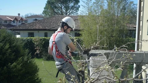 Construction laborer using the drill and safety equipment Stock Footage 106041447