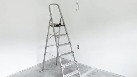 Construction ladder in a white room that is being renovated. Stock Footage 247020586
