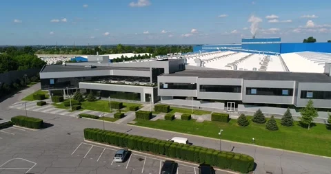 Construction of a large modern factory in its final stages, from above. The Stock Footage 321056426