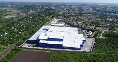 Construction of a large modern factory in its final stages, from above. The Stock Footage 321464012