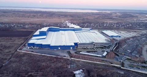 Construction of a large modern factory in its final stages, from above. The Stock Footage 321464014