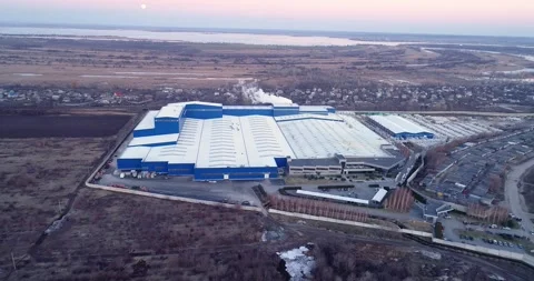 Construction of a large modern factory in its final stages, from above. The Stock Footage 321464076