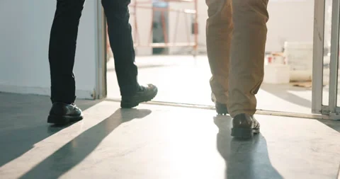 Construction, legs or people on site for inspection, safety check or quality Stock Footage 341460702