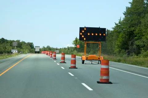 Construction lit arrow  on the highway Stock Photos