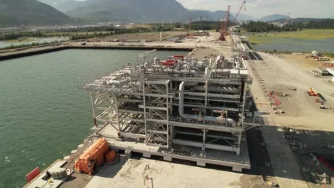 Construction of LNG Canada ship loading structure Stock Footage 250638827