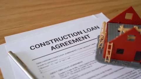 Construction loan agreement contract papers. Concept of getting a loan for Stock Footage 308939375