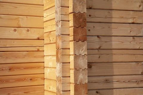 Construction of a log house using planed timber Stock Photos