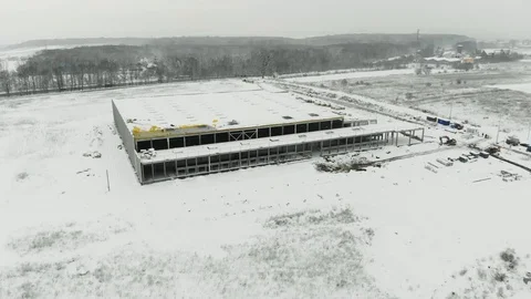 Construction of logistics center in winter Stockbeeldmateriaal 126395485