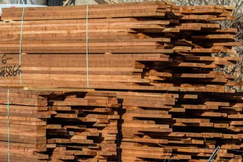Construction lumber at the mill. Mill products. Stock Photos